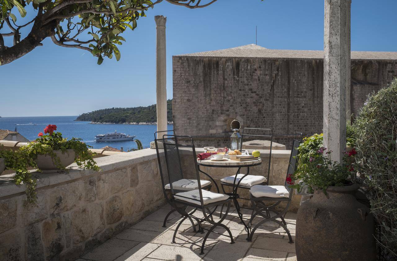 Balcony located at the Villa looking out to the old city of Dubrovnik which is made from old rocks and has its own history within the city